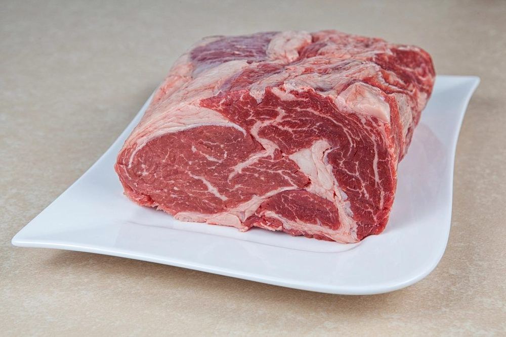 A rolled beef joint cut to order